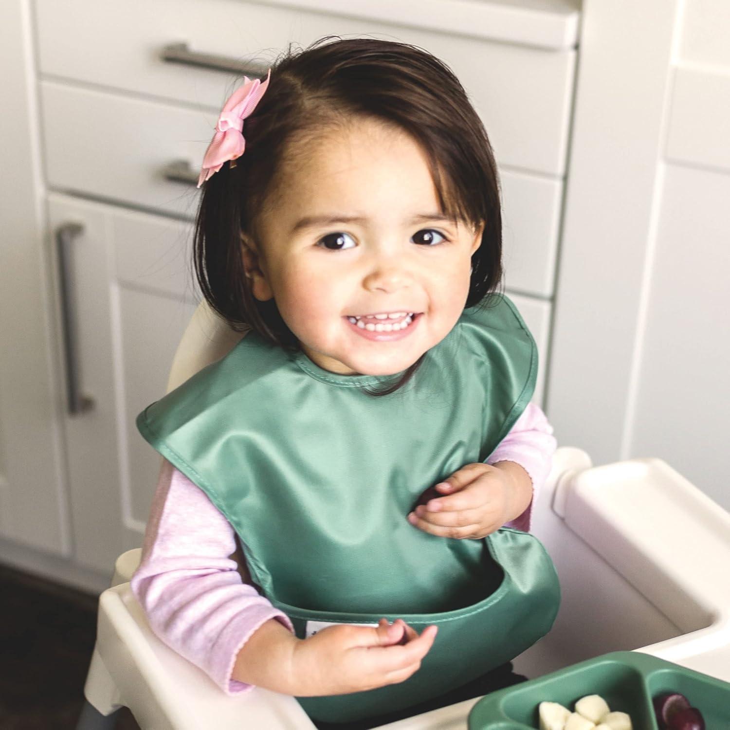 image:imageTiny Twinkle MessProof Baby Bibs for Eating Waterproof Wipeable Toddler Bibs with CatchAll Pocket Feeding Bibs for Girls amp Boys3 PackCowboy3pack Dinosaur